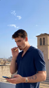 man smoking cigar